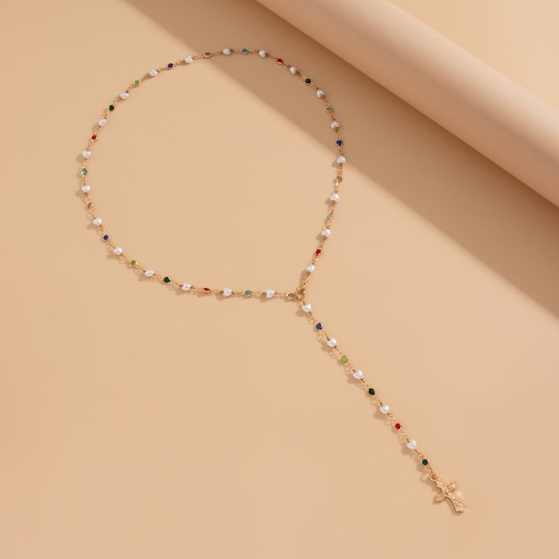 Длинное колье-галстук с металлическими вставками и крестом CJH44370