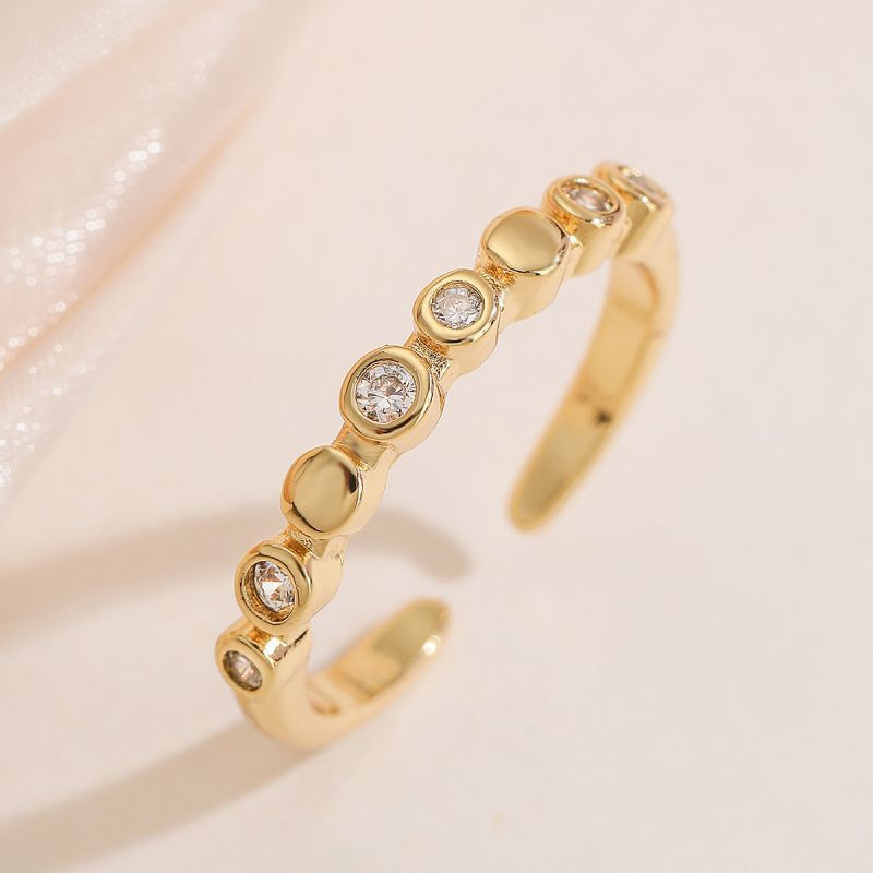 Разомкнутая дорожка из круглых фианитов в золотистой оправе CJL20481