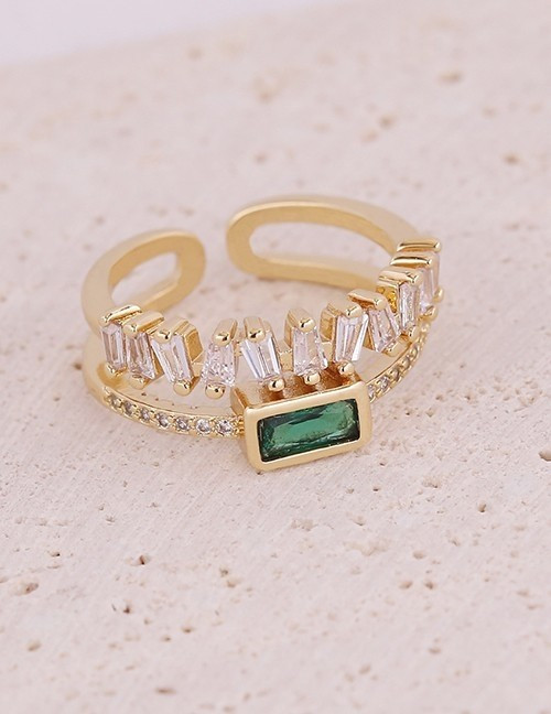 Двойное кольцо с изумрудным прямоугольником и дорожкой камней S45734