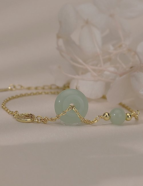 Золотистый браслет с нефритовыми вставками и древом M12041