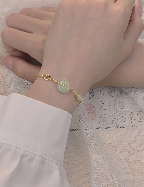 Золотистый браслет с нефритовыми вставками и древом M12041