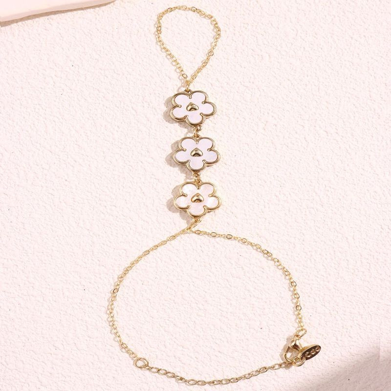 Браслет слейв трио черных цветов на золотой цепи