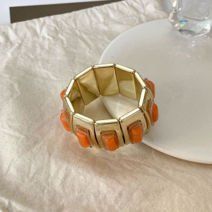 Браслет жесткий шарнирный с цветными вставками под камень CJN37504