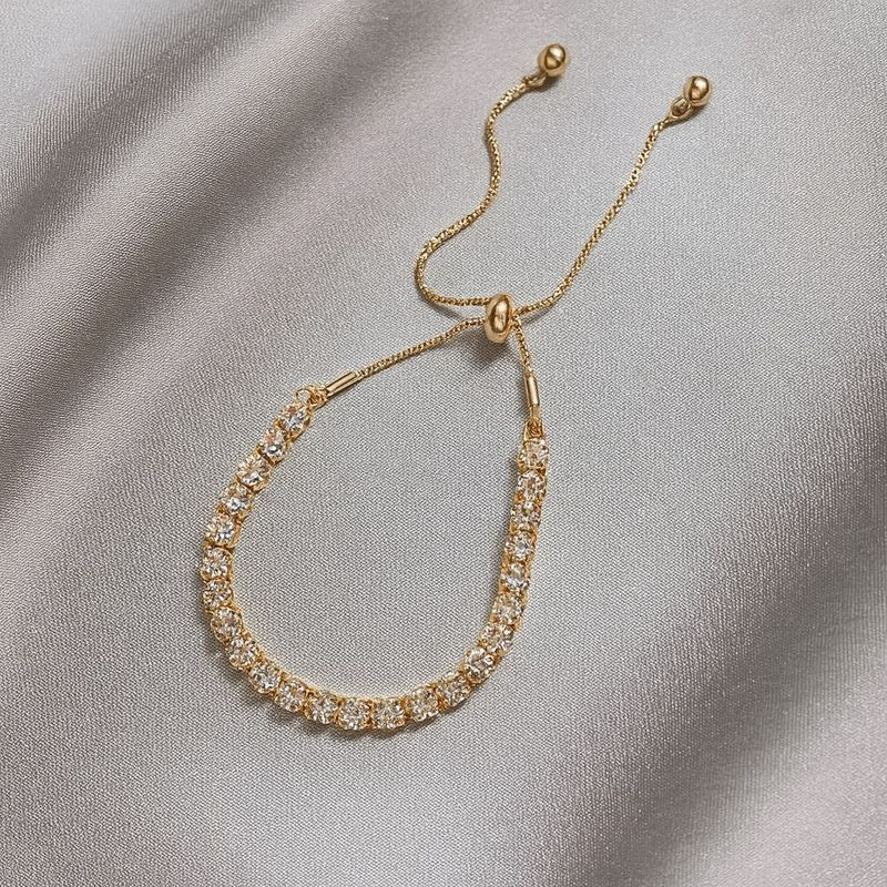 Браслет медь циркон напыление золотом 1J12505CJJ Браслет медь циркон напыление золотом 1J12505CJJ