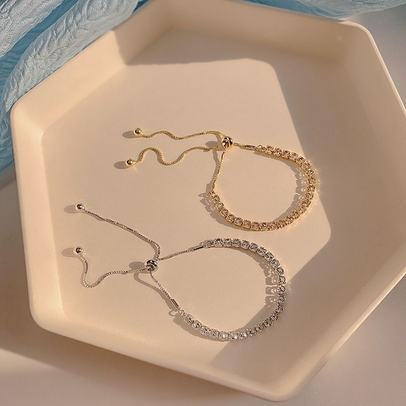 Браслет медь циркон напыление золотом 1J12505CJJ Браслет медь циркон напыление золотом 1J12505CJJ