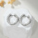 Широкие серьги-кольца с дорожками камней CJL32186