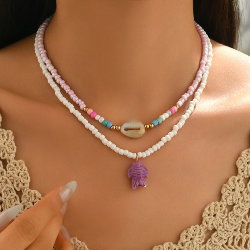 Двойной жемчужный чокер с розовой морской звездой и рыбкой CJR61463