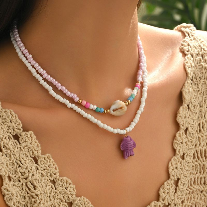 Двойной жемчужный чокер с розовой морской звездой и рыбкой CJR61463