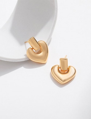 Золотистые серьги-пусеты «Объемные сердца» Z63460 Золотистые серьги-пусеты «Объемные сердца» Z63460