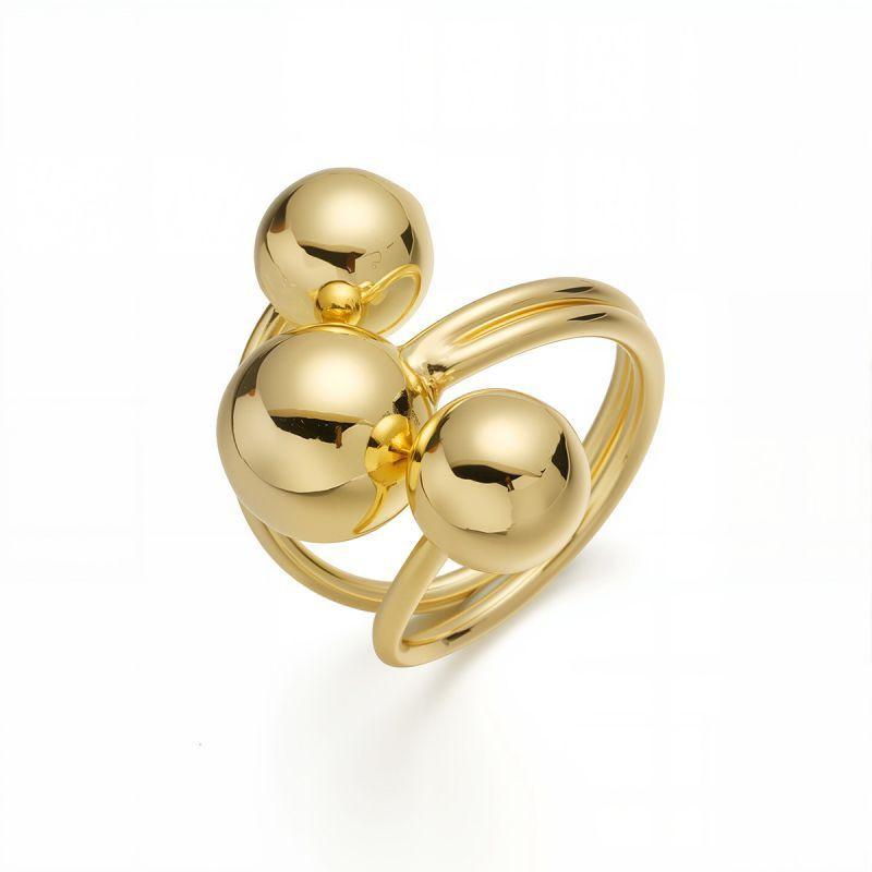 Авангардное кольцо с тремя крупными золотистыми сферами CJM27966