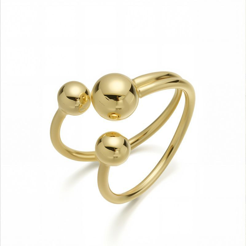 Авангардное кольцо с тремя крупными золотистыми сферами CJM27966