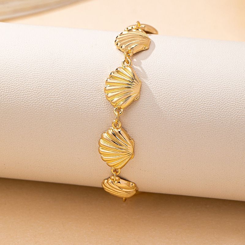 Браслет цепочка с золотистыми овальными вставками CJP54235