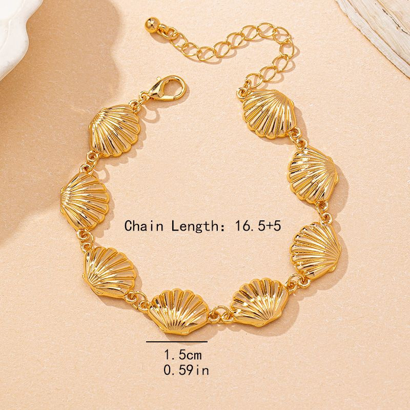 Браслет цепочка с золотистыми овальными вставками CJP54235