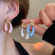Минималистичные серьги петли с белыми эмалевыми вставками CJL19402