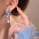 Серебристые серьги с бабочкой и жемчугом из циркона CJX87427