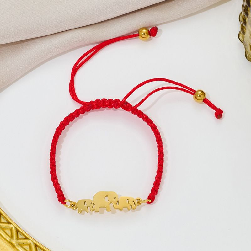 Браслет плетеная нить с золотистой надписью Love CJQ65921