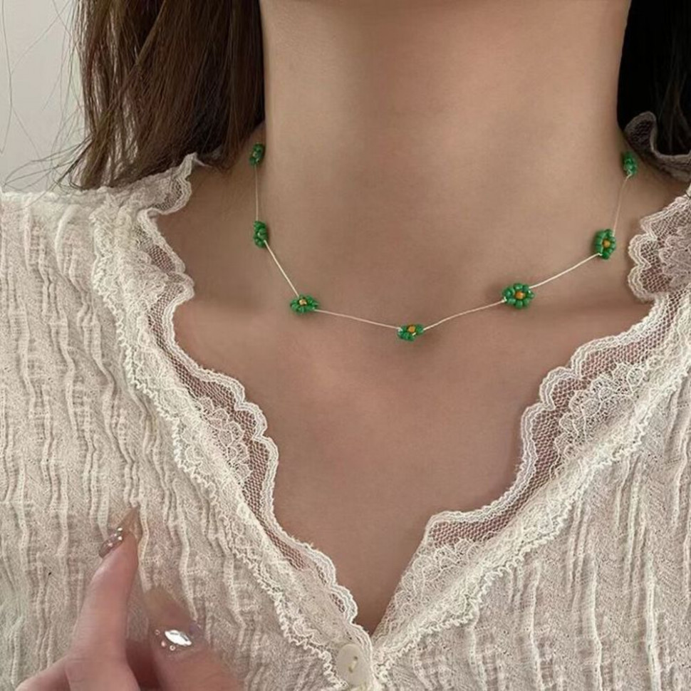 Золотистая цепочка с равномерными вставками из зеленых кристаллов CJJ05745 Золотистая цепочка с равномерными вставками из зеленых кристаллов CJJ05745