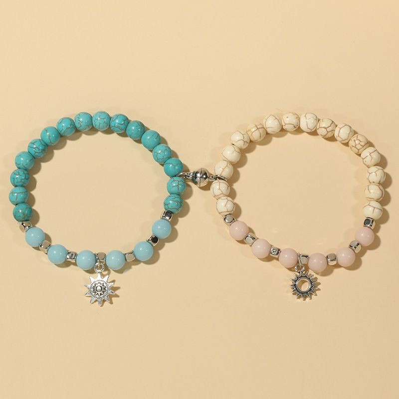 Парные браслеты солнечный берег с подвесками-цветами R19776