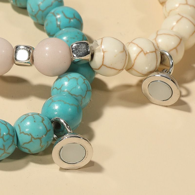 Парные браслеты солнечный берег с подвесками-цветами R19776