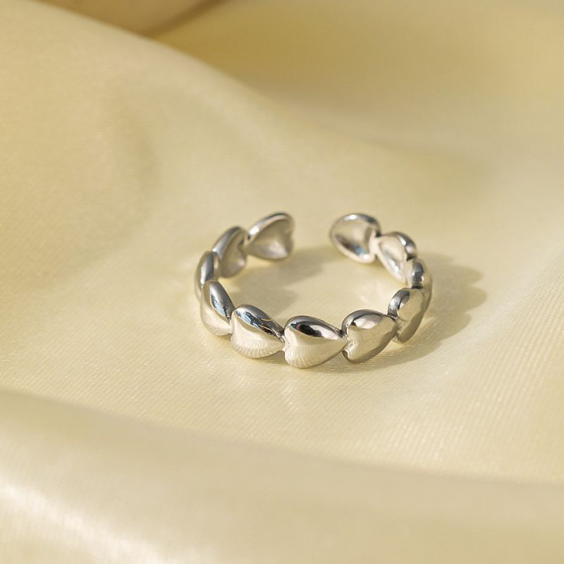 Разомкнутое кольцо из стальных объемных сердец CJH16069