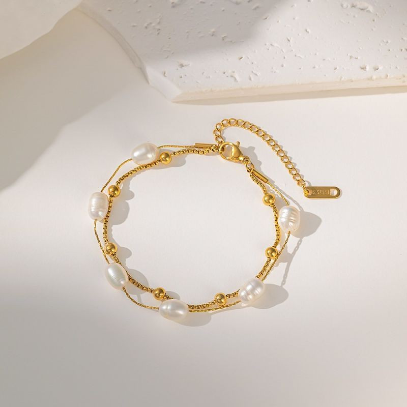 Браслет-цепочка с жемчужными вставками CJG52096