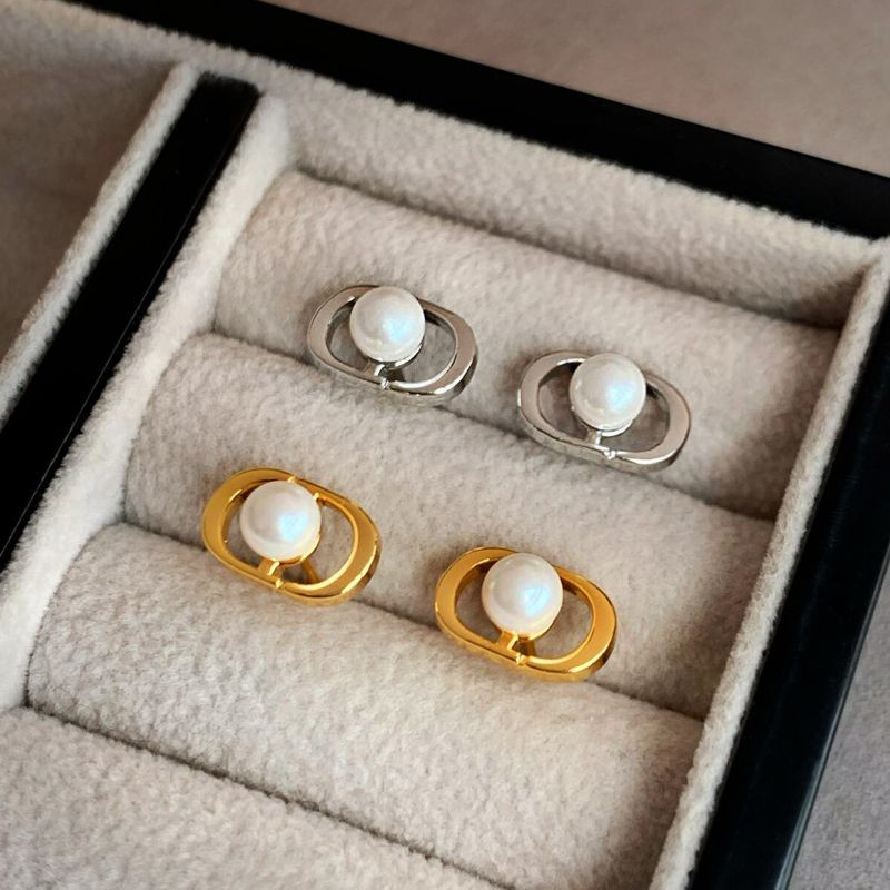 Серьги-гвоздики с жемчужиной в геометрической оправе 1J11984CJJ