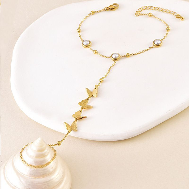 Слейв-браслет порхающие бабочки с золочением