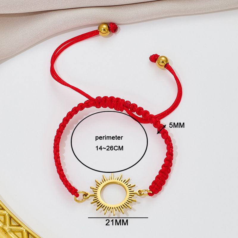 Браслет плетеная нить с золотистым ажурным солнцем CJQ65913