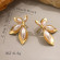 Серьги с цветочным рисунком из титановой стали CJX78285 Серьги с цветочным рисунком из титановой стали CJX78285