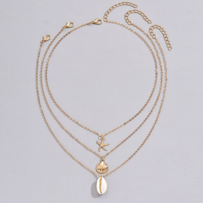Трехслойное колье с ракушками и подвеской-кошельком CJQ27185
