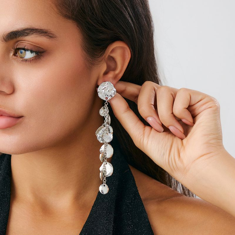 Длинные золотистые серьги с каскадом дисков CJN79324