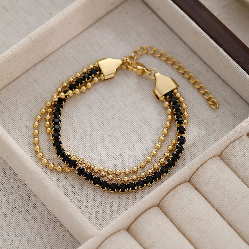 Браслет многослойный с розовым бисером и золотистыми цепями CJN91343