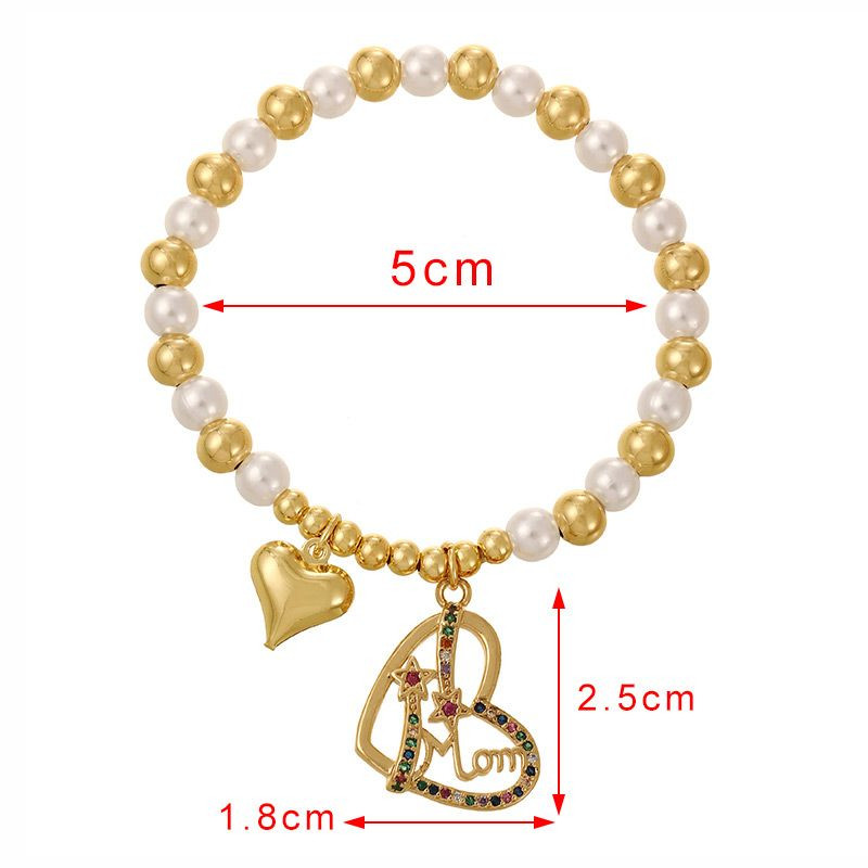 Браслет из белого жемчуга с золотистыми подвесками CJL22888