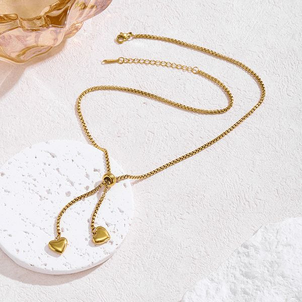 Золотистое колье-галстук с сердцами CJL89991 Золотистое колье-галстук с сердцами CJL89991