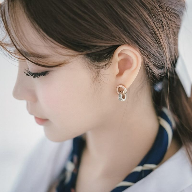 Серьги-пусеты с двойными кольцами и инкрустацией фианитами 1J12473CJJ