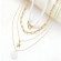 Четырехслойное колье с белым чокером и подвеской-ракушкой CJR81451
