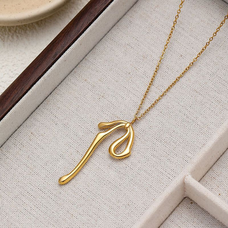 Золотистое колье-галстук с каплей CJN91851