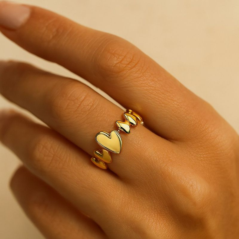 Золотистое кольцо-дорожка из объемных сердец 1J12422CJJ