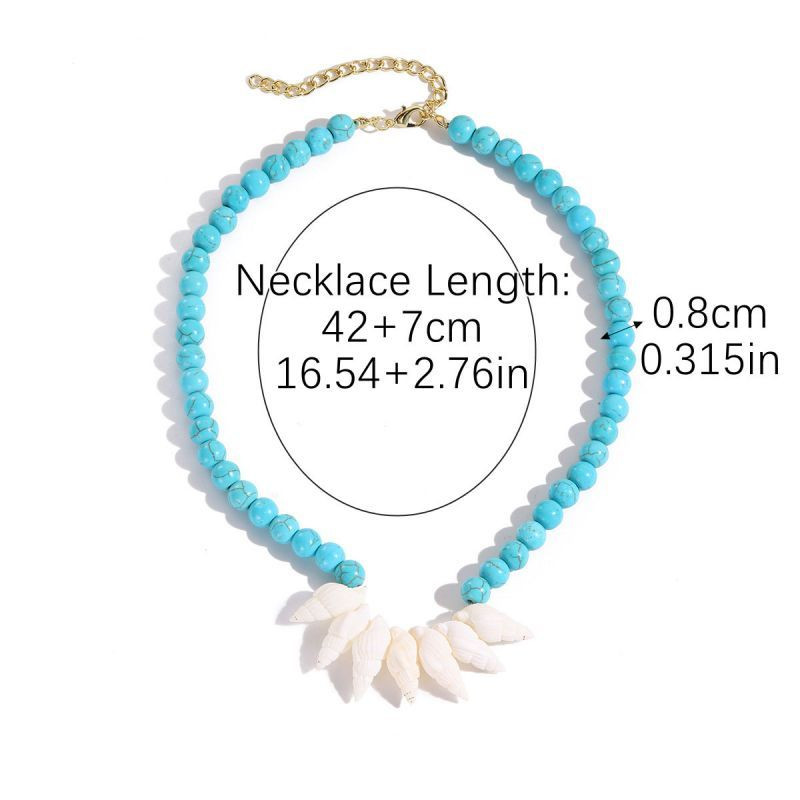 Бусы из бирюзового камня с центральной вставкой из белых ракушек CJN31921