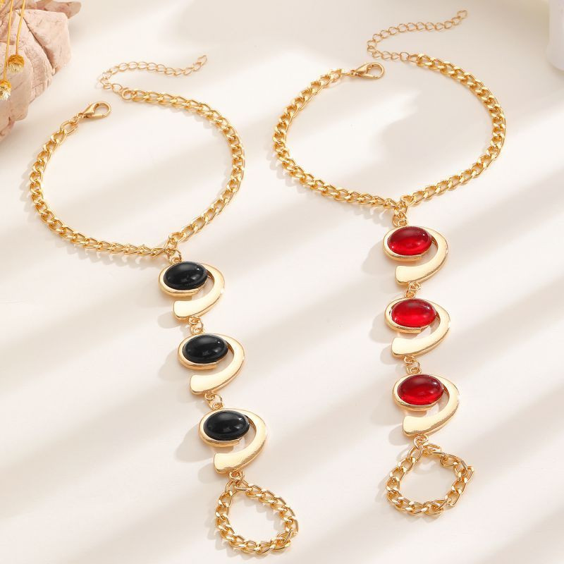 Браслет слейв трио черных опалов в золоте