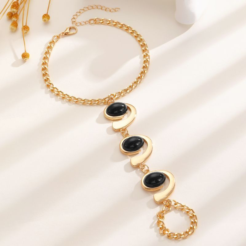 Браслет слейв трио черных опалов в золоте