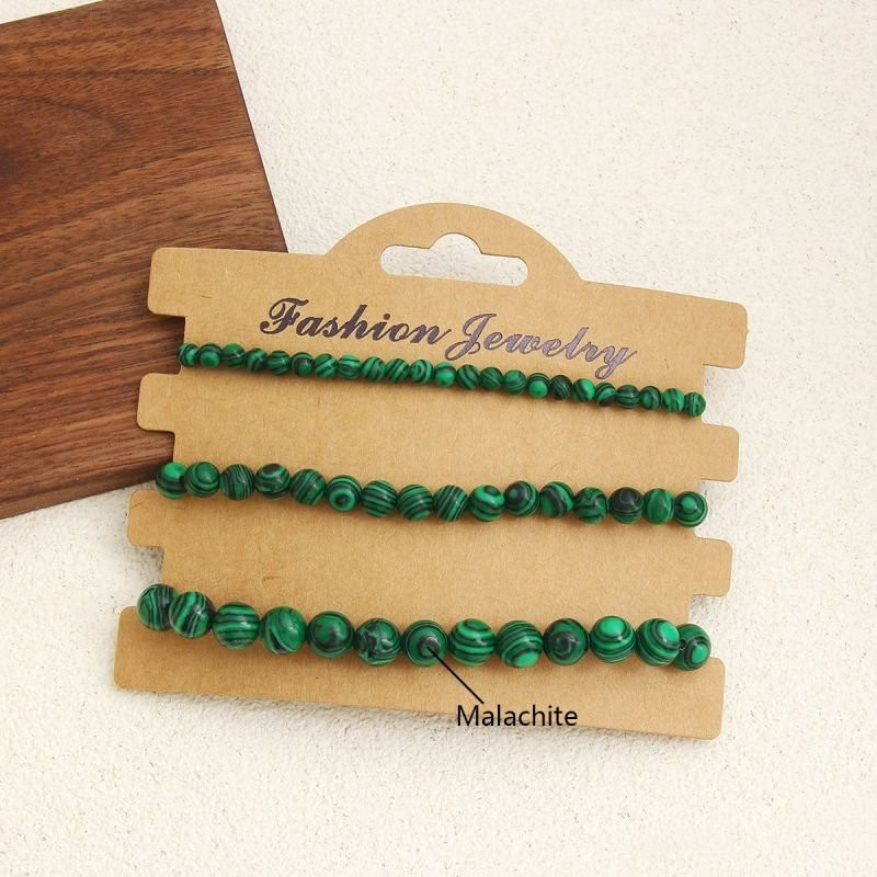 Комплект из 4 браслетов из розового камня CJD80408 Комплект из 4 браслетов из розового камня CJD80408