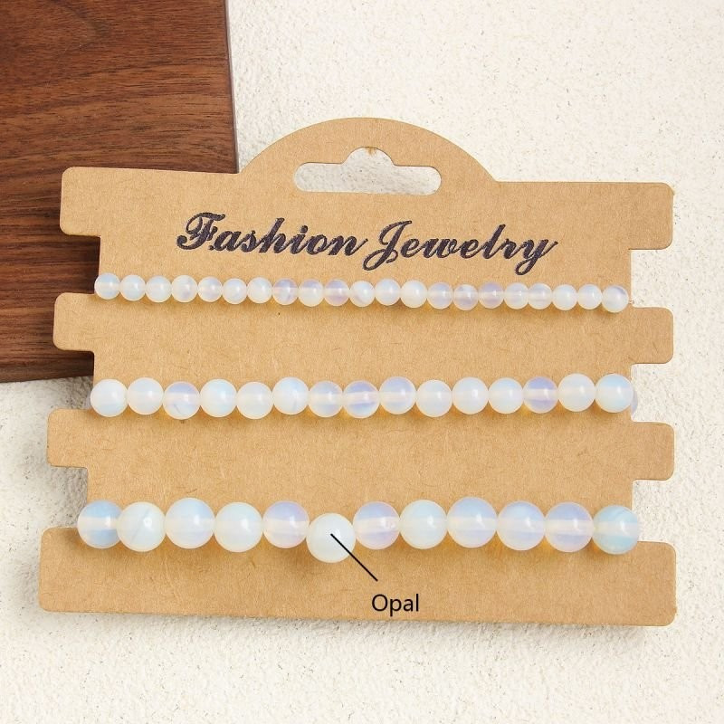 Комплект из 4 браслетов из розового камня CJD80408 Комплект из 4 браслетов из розового камня CJD80408