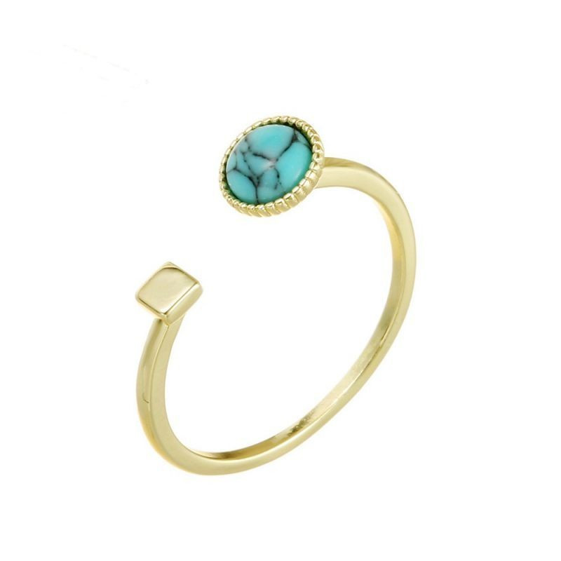 Разомкнутое кольцо с россыпью цветных камней и золотистым напылением CJG49659