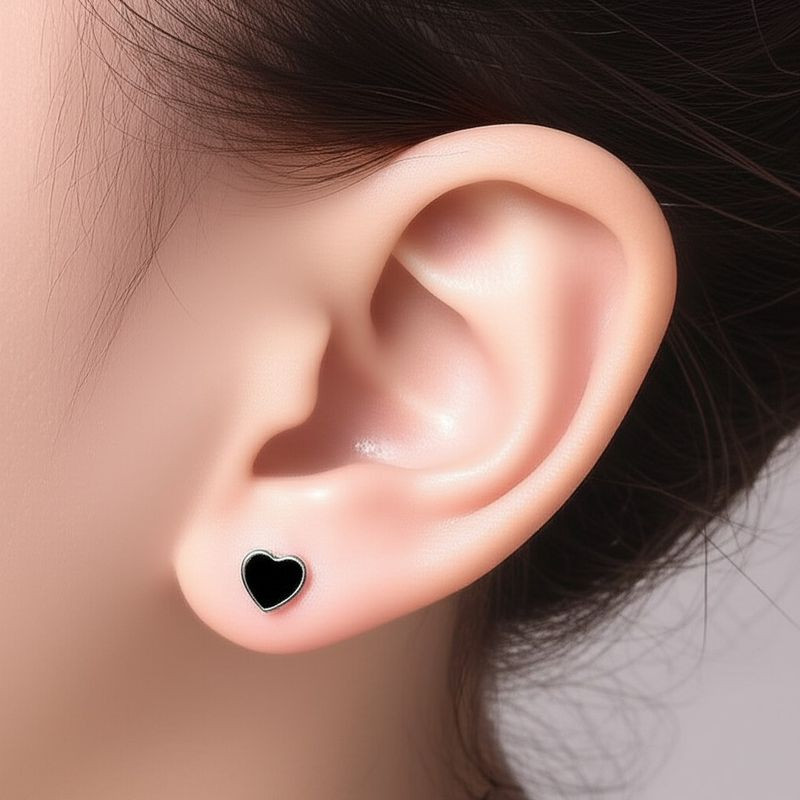 Серьги-гвоздики сердца с чёрной вставкой 1J11951CJJ