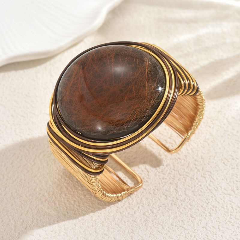 Браслет жесткий шарнирный с крупным круглым камнем CJT17335