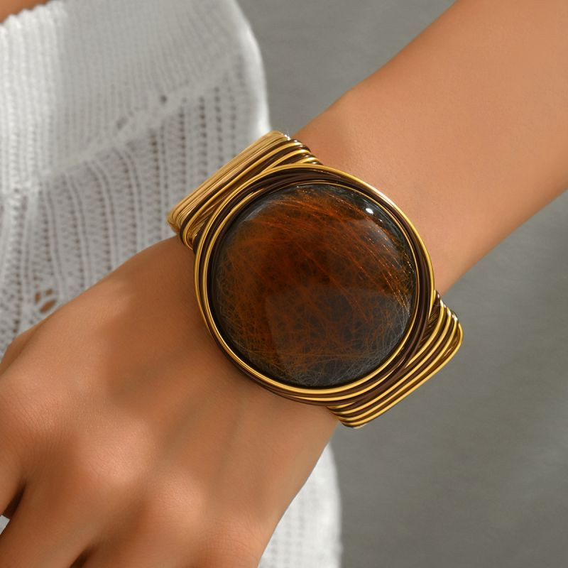 Браслет жесткий шарнирный с крупным круглым камнем CJT17335