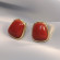 Яркие стальные серьги-пусеты с алой эмалью и золотым кантом 1J11249CJJ