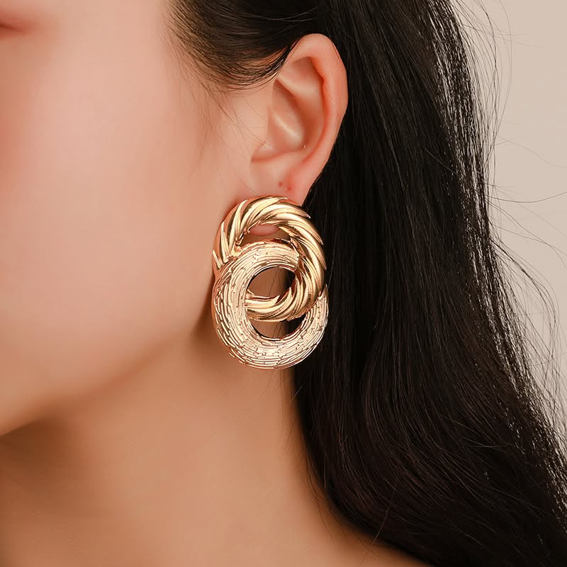 Массивные серьги-кольца из переплетенных золотистых нитей 1J11595CJJ