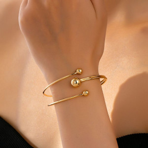 Браслет жесткий разомкнутый с шариками на концах CJP54226 Браслет жесткий разомкнутый с шариками на концах CJP54226